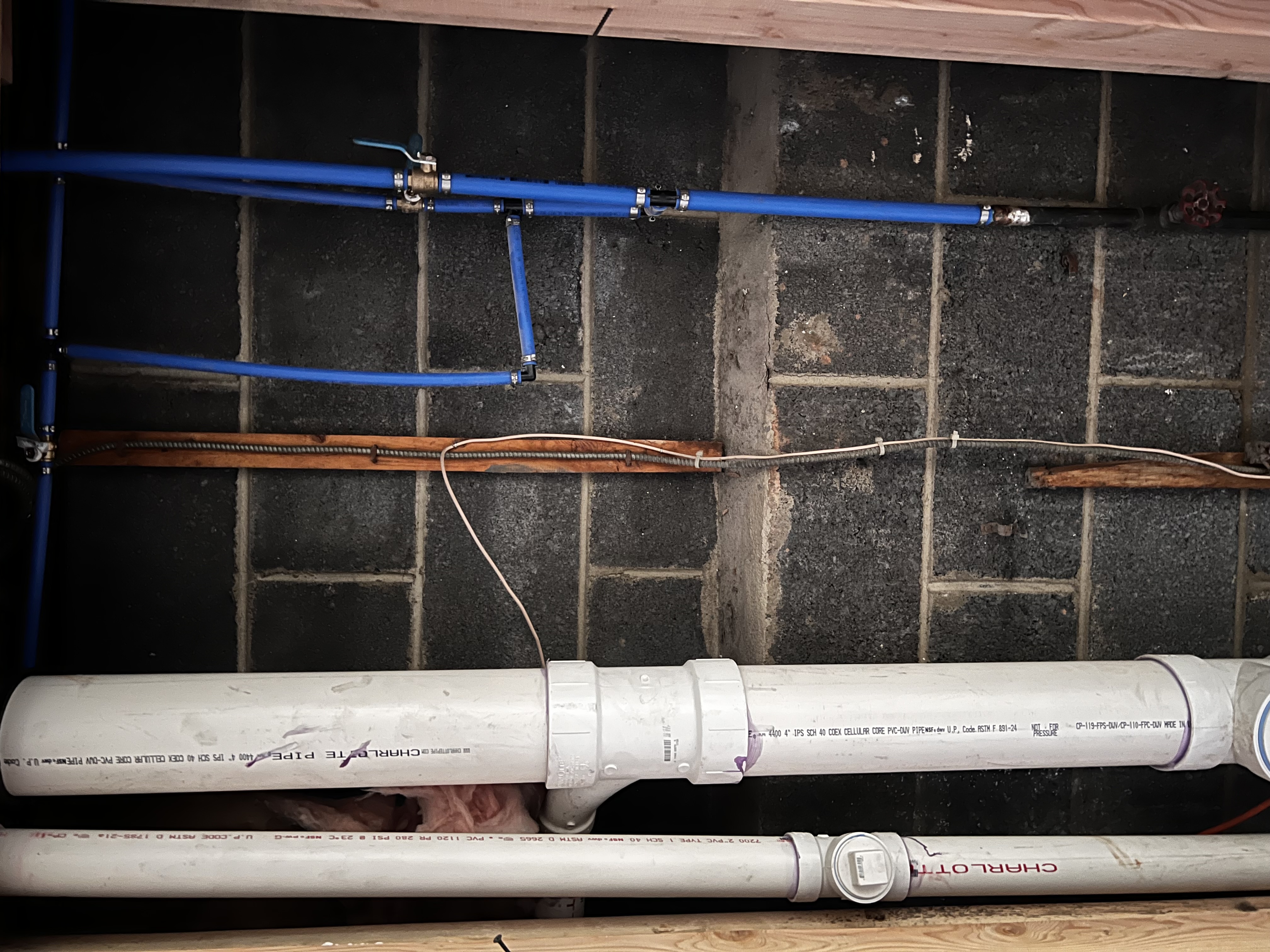 Copper pipe plumbing installation in new construction